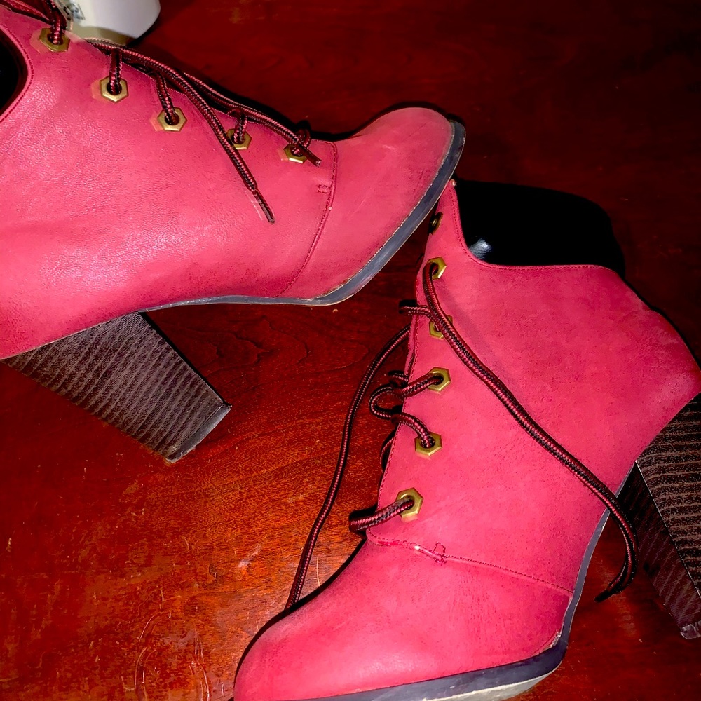 Lace up mid high boots.
